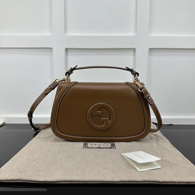 G*u*i top handle bags
